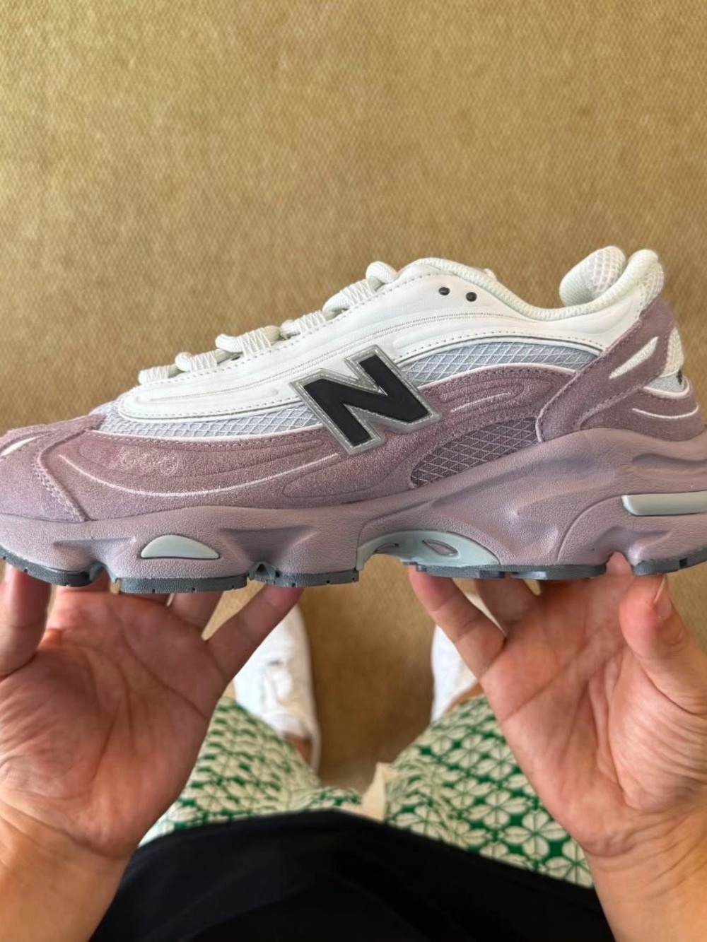 New Balance Women's Sneaker in Lavender and White with Black 'N' Logo